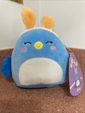 Squishmallows Bebe Plush Toy - Blue, Cream & Yellow with Orange Ears